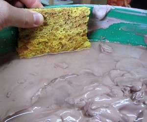 remove excess water with a sponge